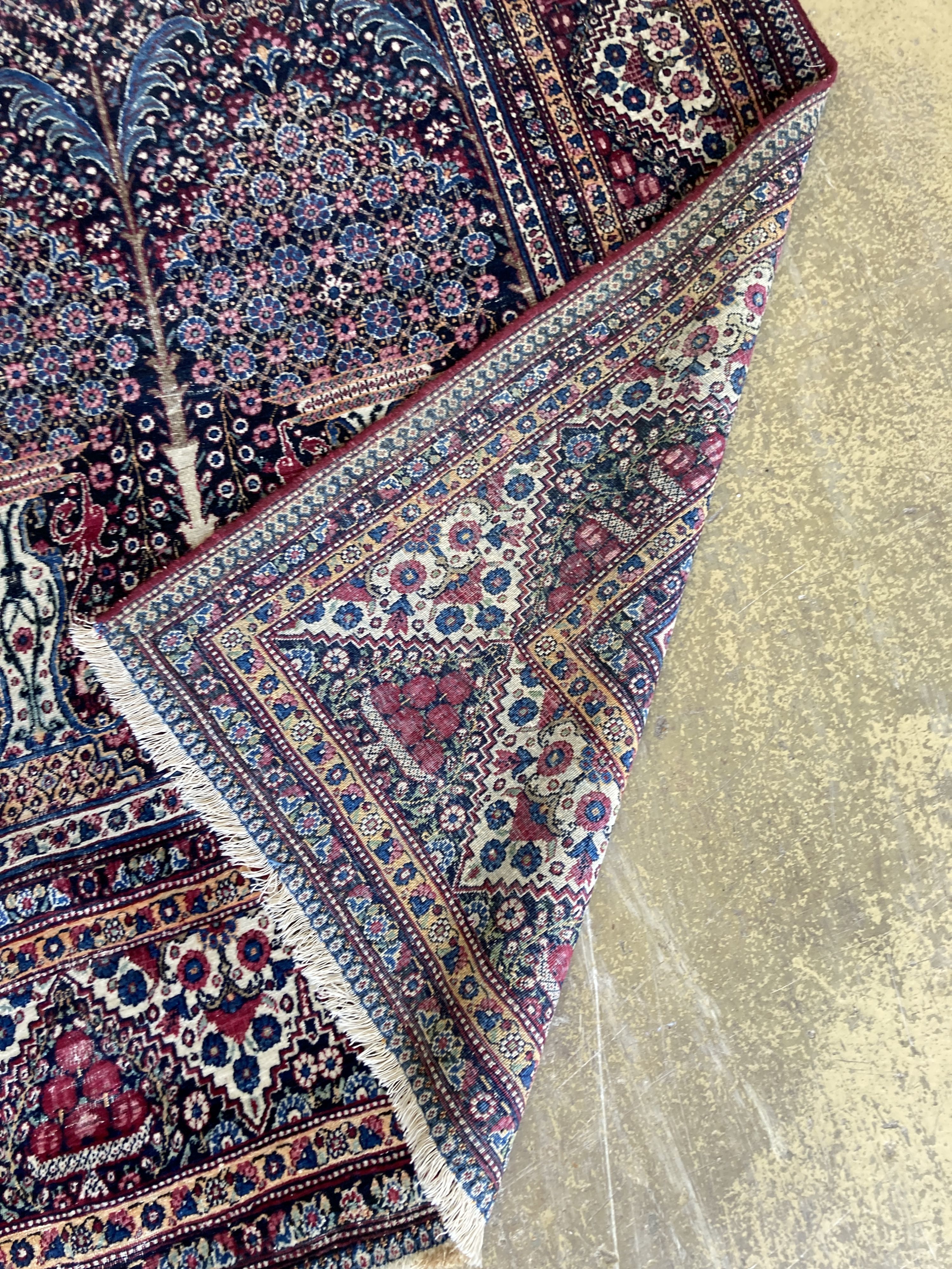 An Isphahan blue ground rug, 248 x 140cm